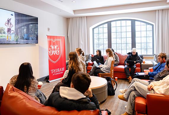 Marist students gather in Ward Hall to watch and rate Super Bowl Ads. 